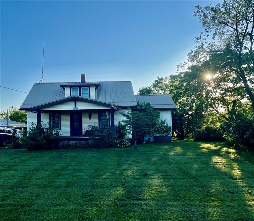 a view of a house with a garden