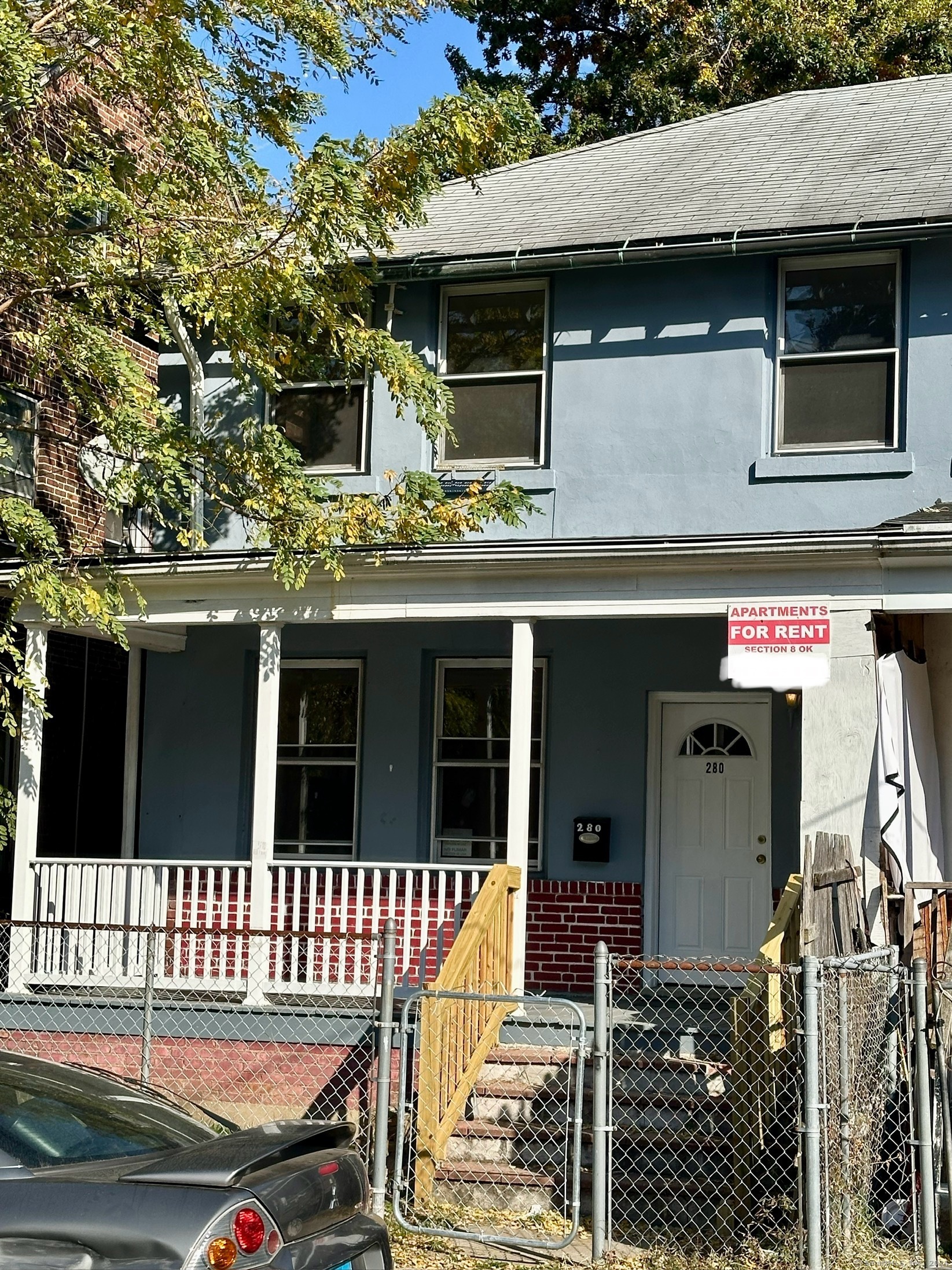 a view of a house with a porch