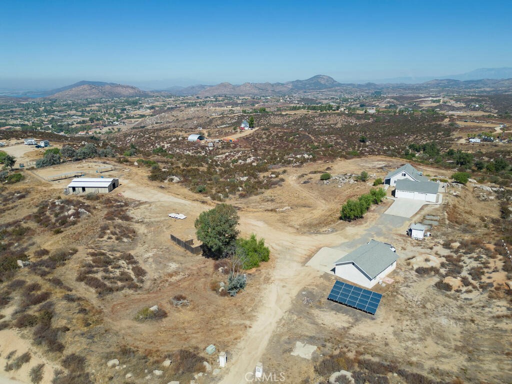 an aerial view of residential house with beach