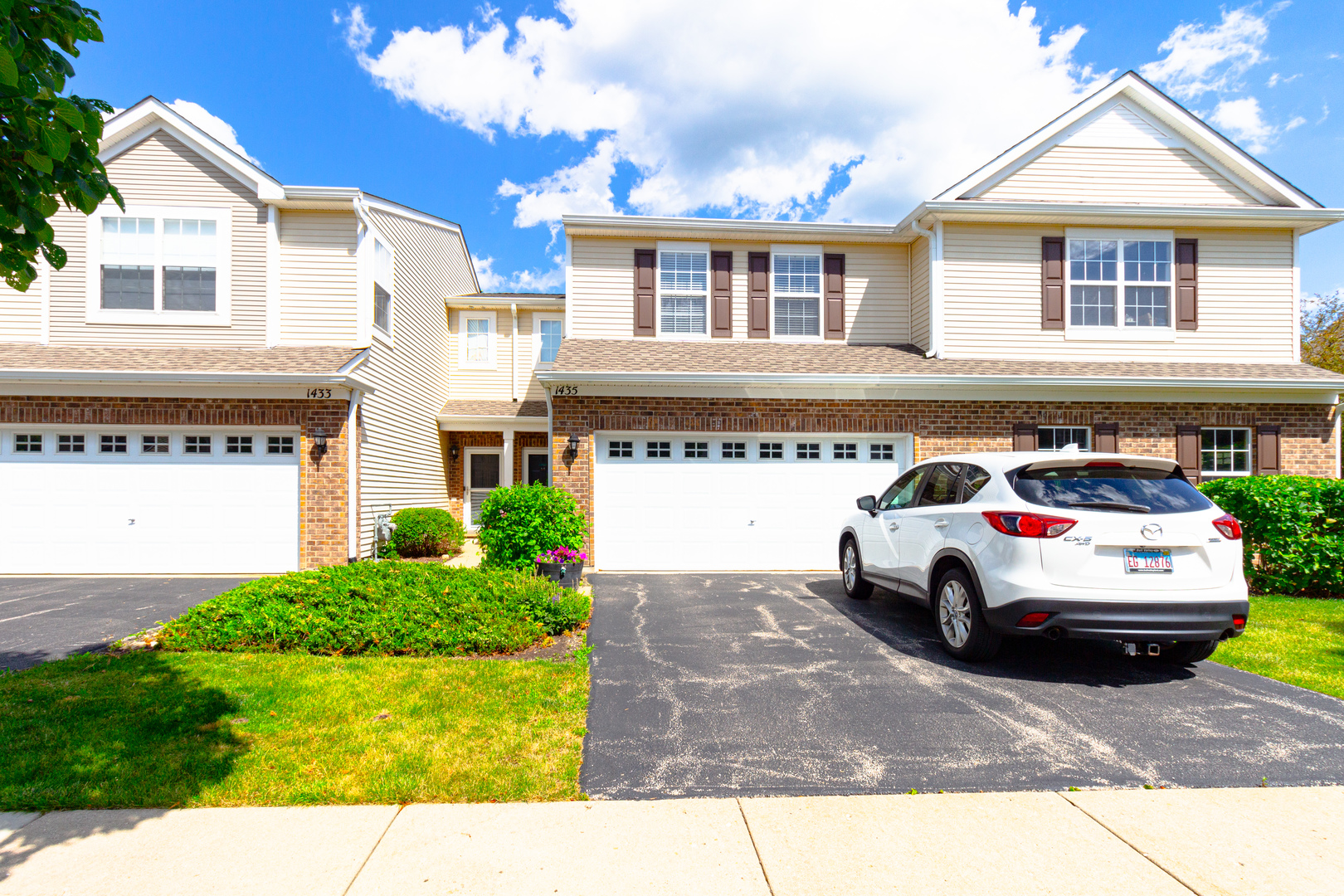 a car parked in front of a house