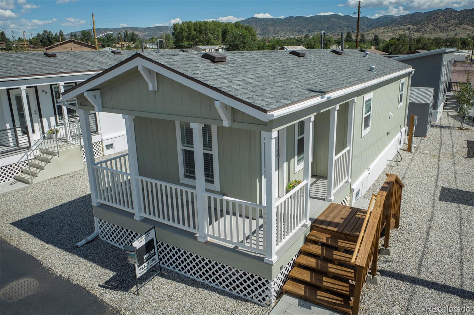 an aerial view of a house with a balcony