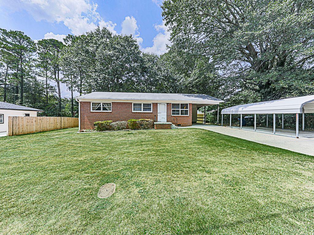 a house view with a garden space