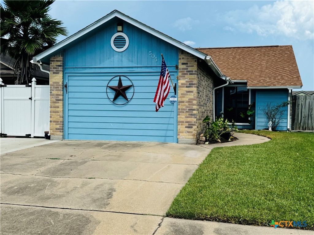 a front view of house with yard