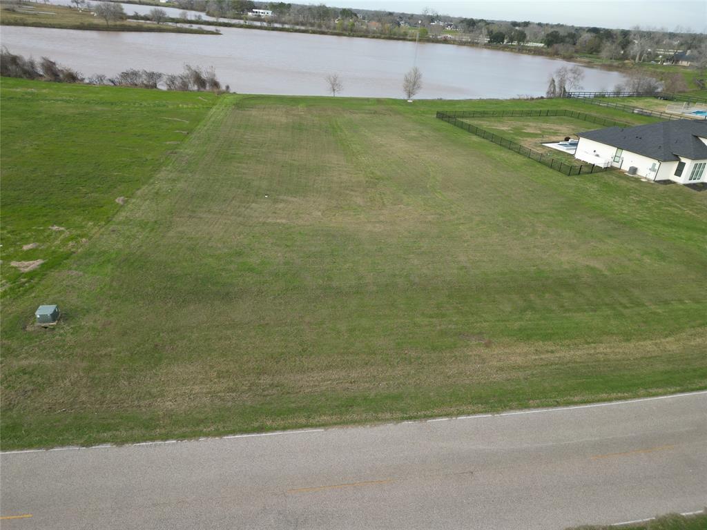 a view of a field with an outdoor space