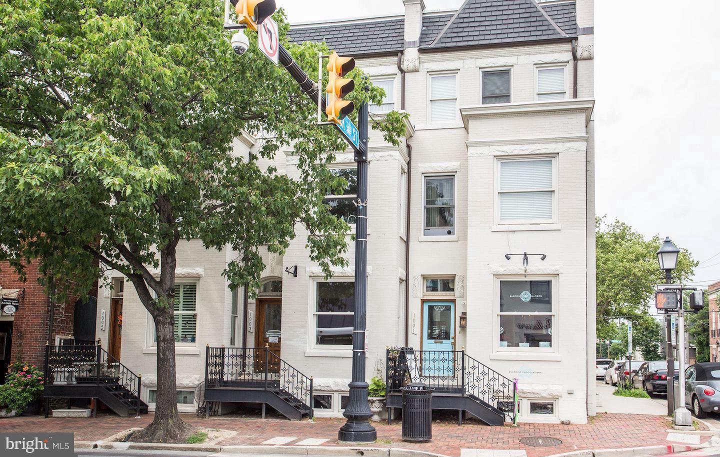 a front view of a building with street view