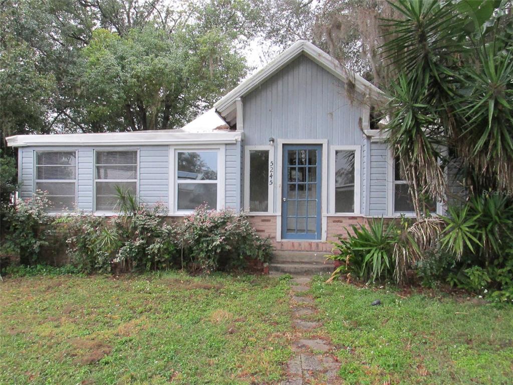 a view of a house with garden