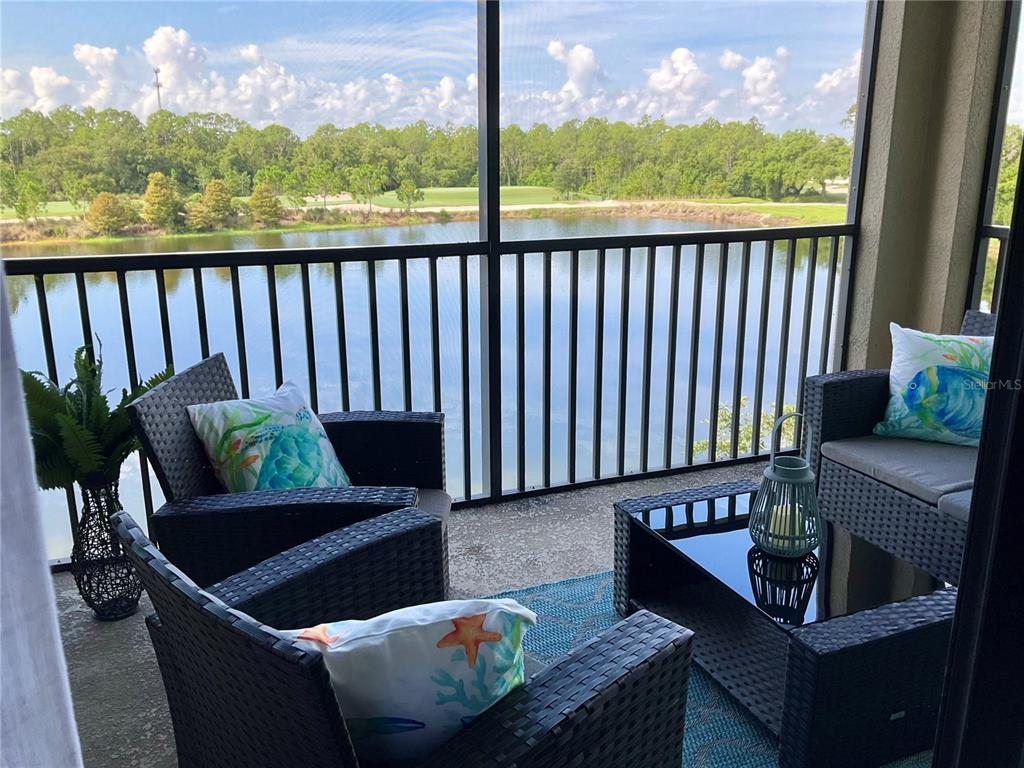 Screened in lanai overlooking the 12 fairway and green