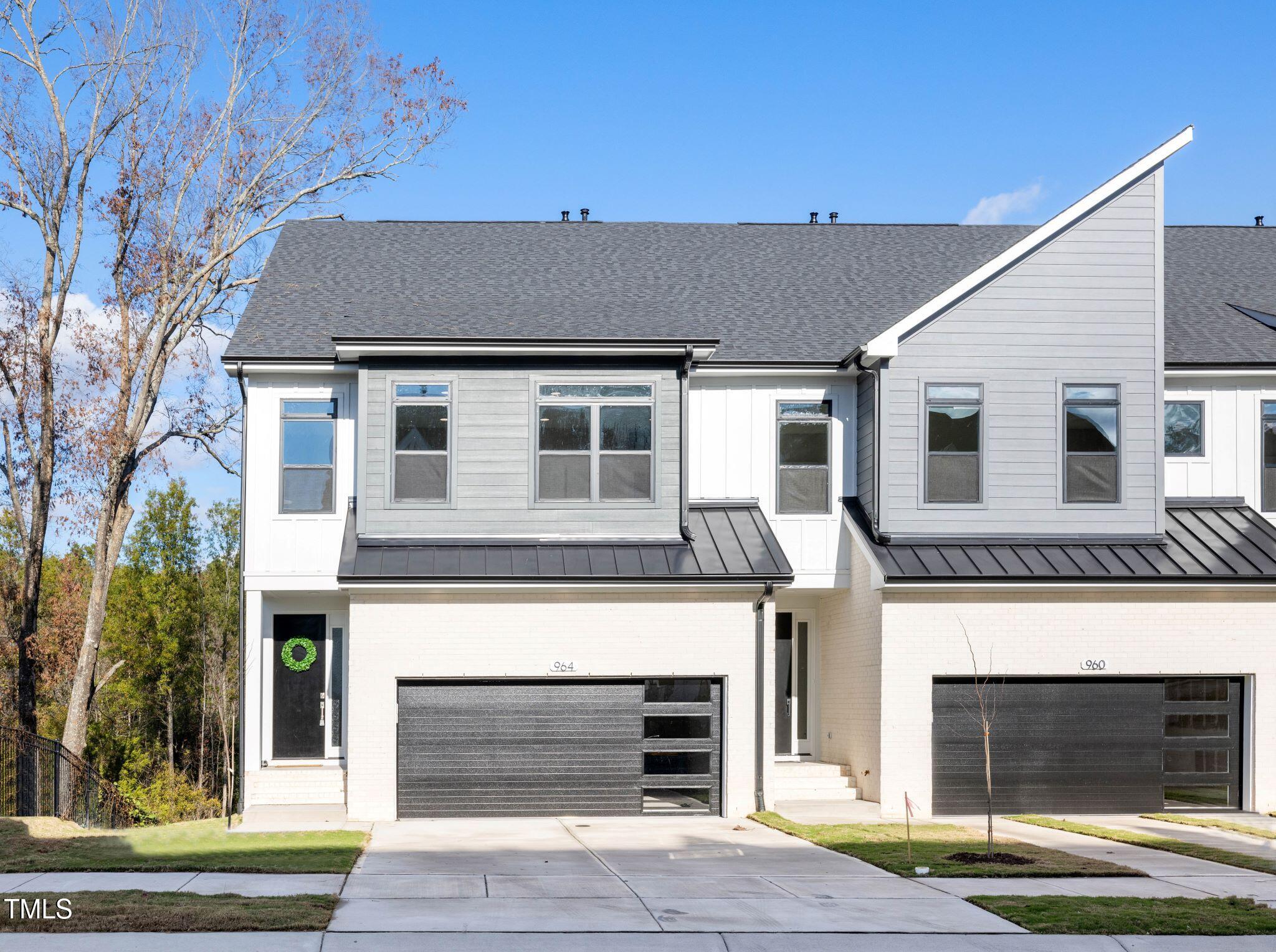 a front view of a house with yard