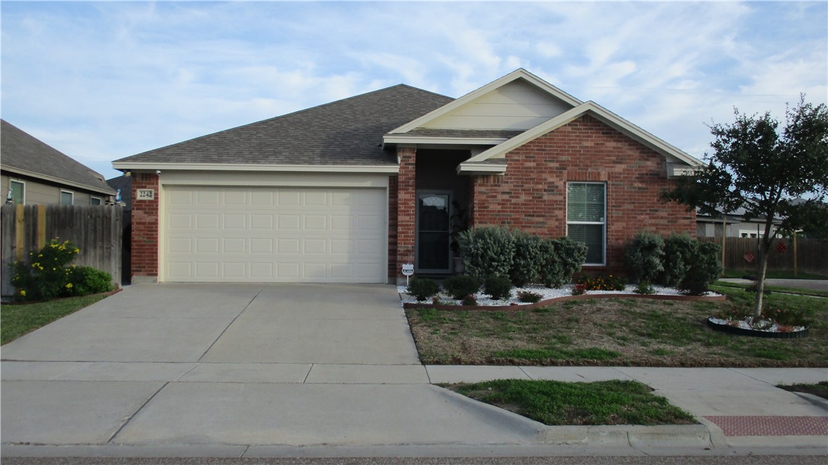 a front view of house with a yard