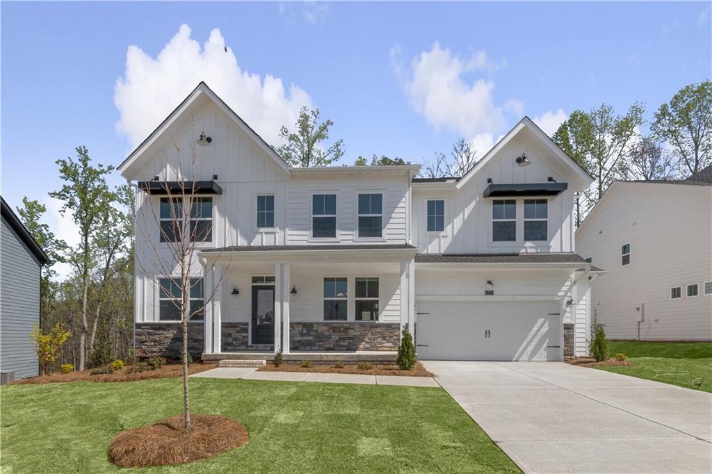 front view of a house with a yard