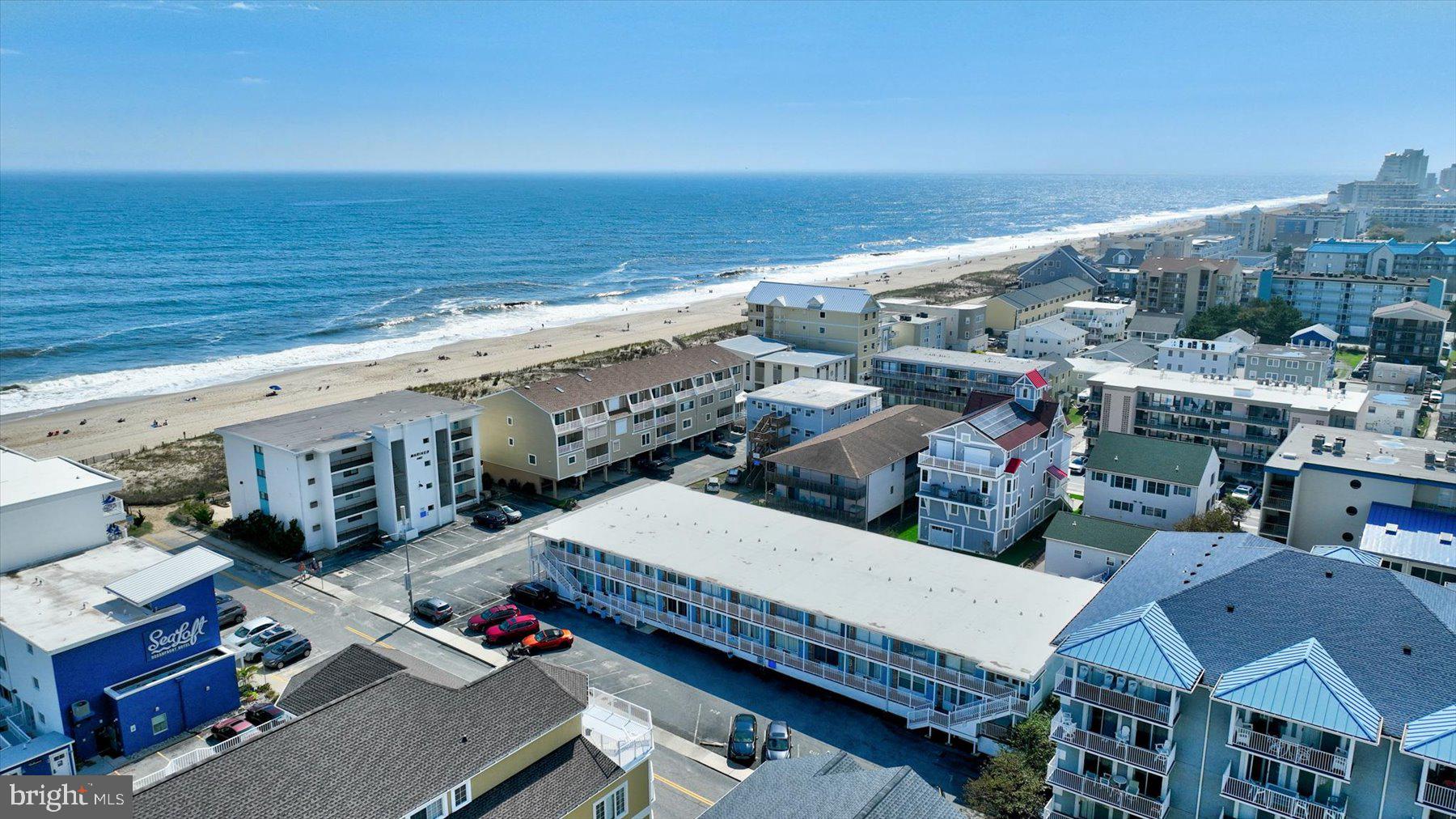 a view of city with ocean