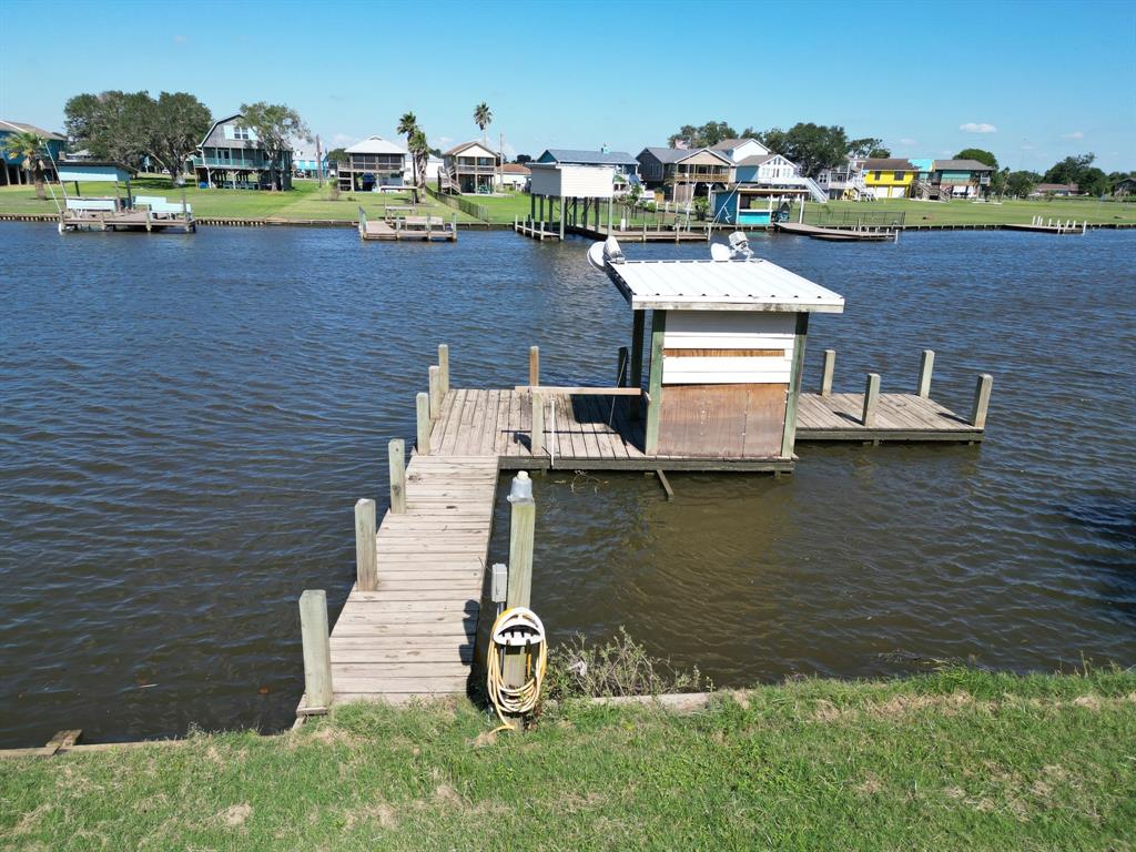 a aerial view of a house with a lake view