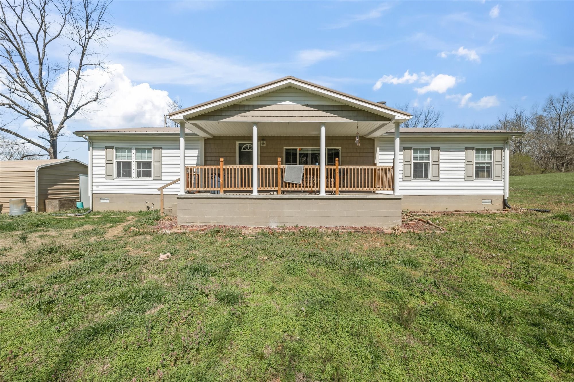 front view of a house with a yard