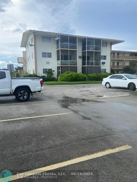 a car parked in front of a house