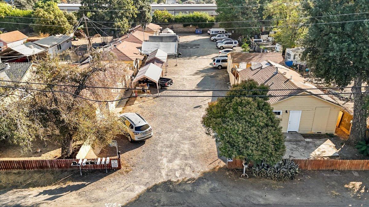 an aerial view of a house with outdoor space