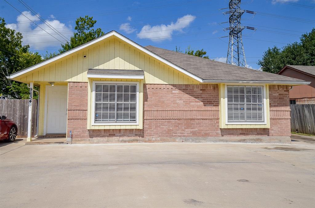 a front view of a house with a garage