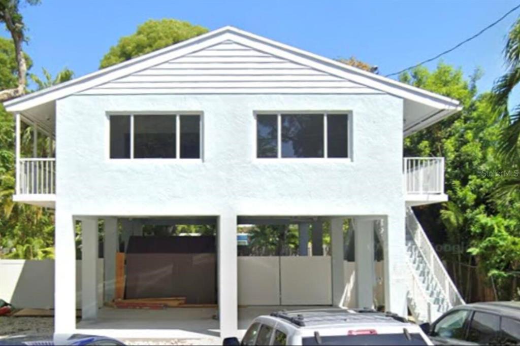 a front view of a house with a balcony