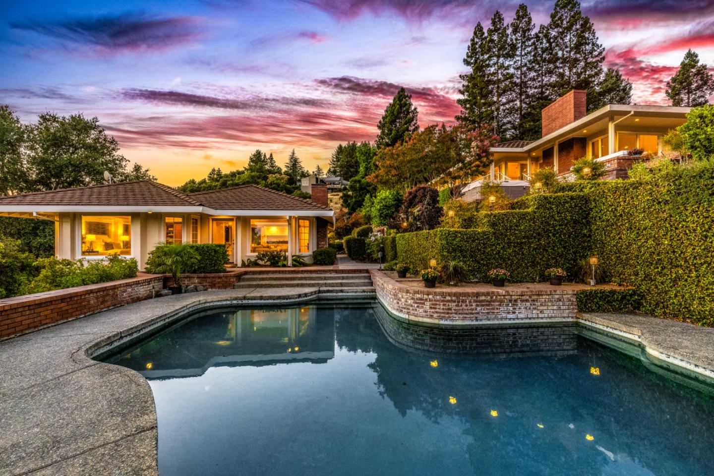 a view of a swimming pool with a patio