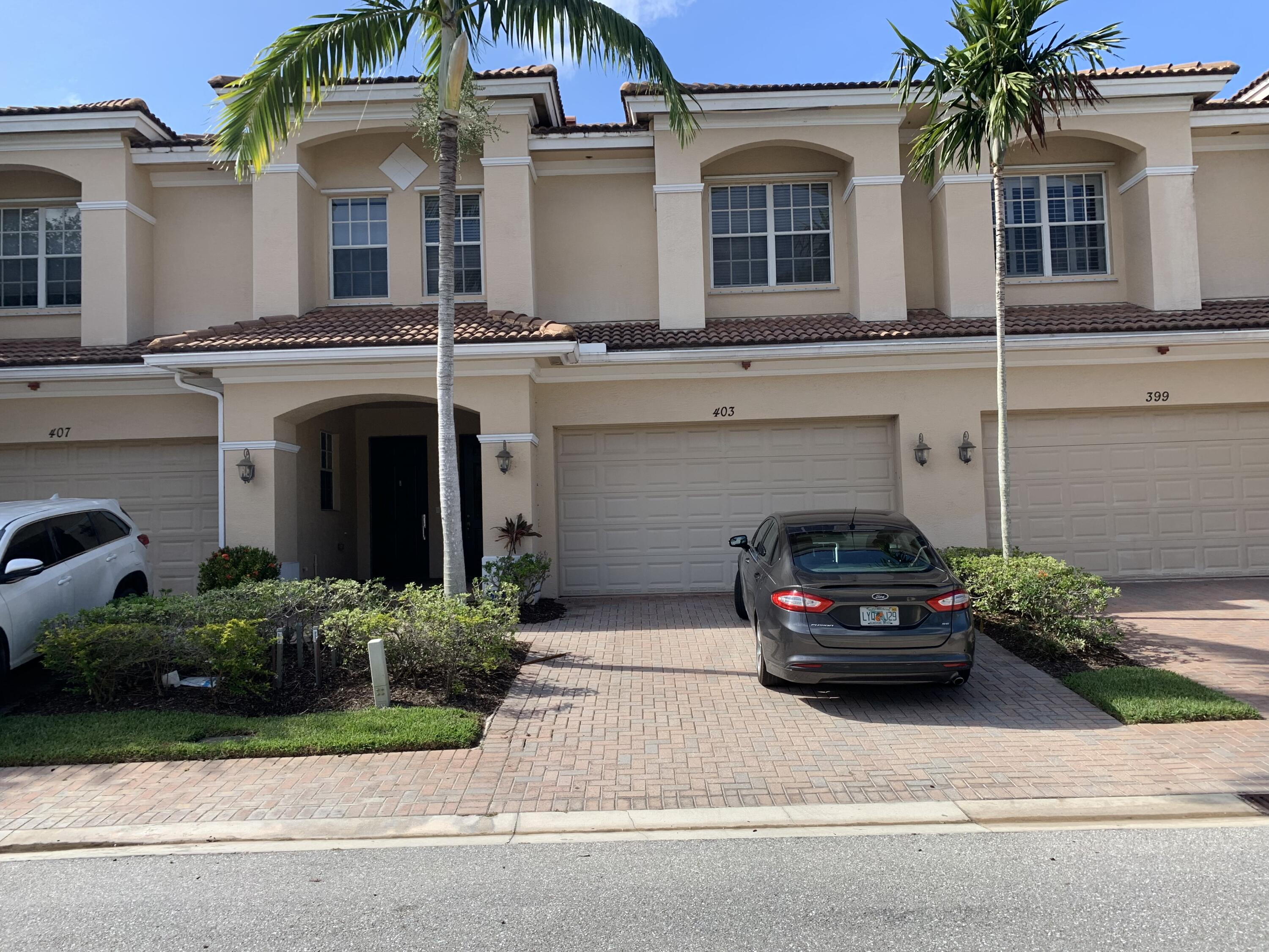 front view of a house with a street