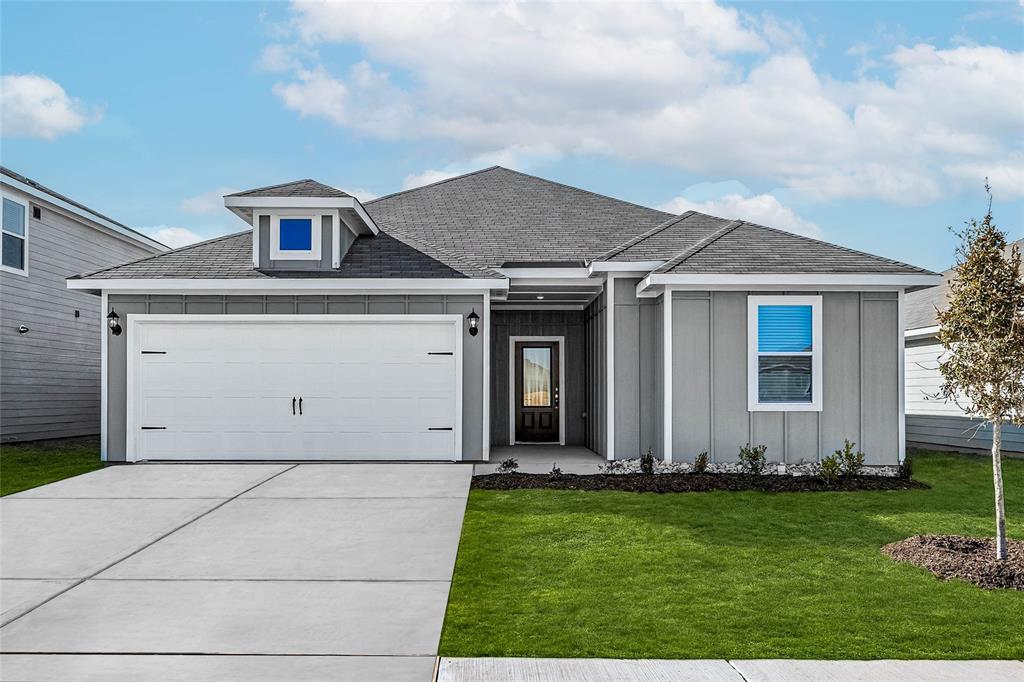 front view of house with a yard