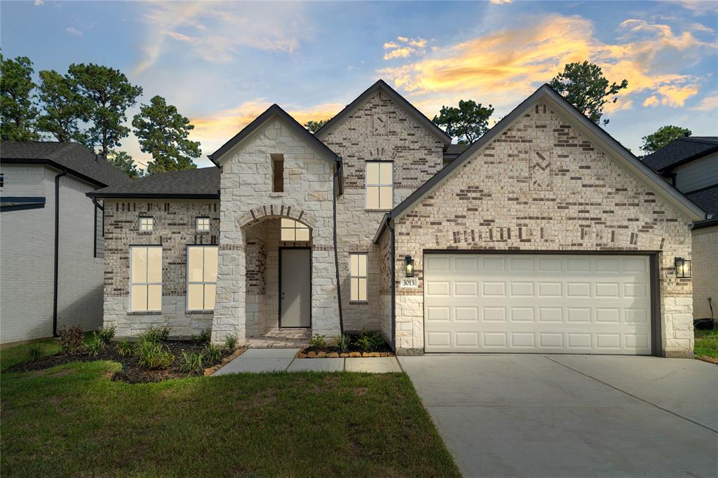 Welcome home to 3013 Mesquite Pod Trail located in Barton Creek Ranch and zoned to Conroe ISD.