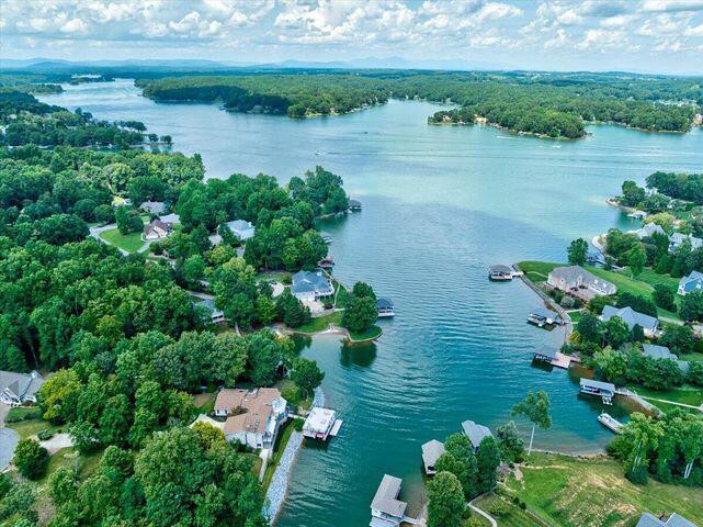 a view of a lake with a yard