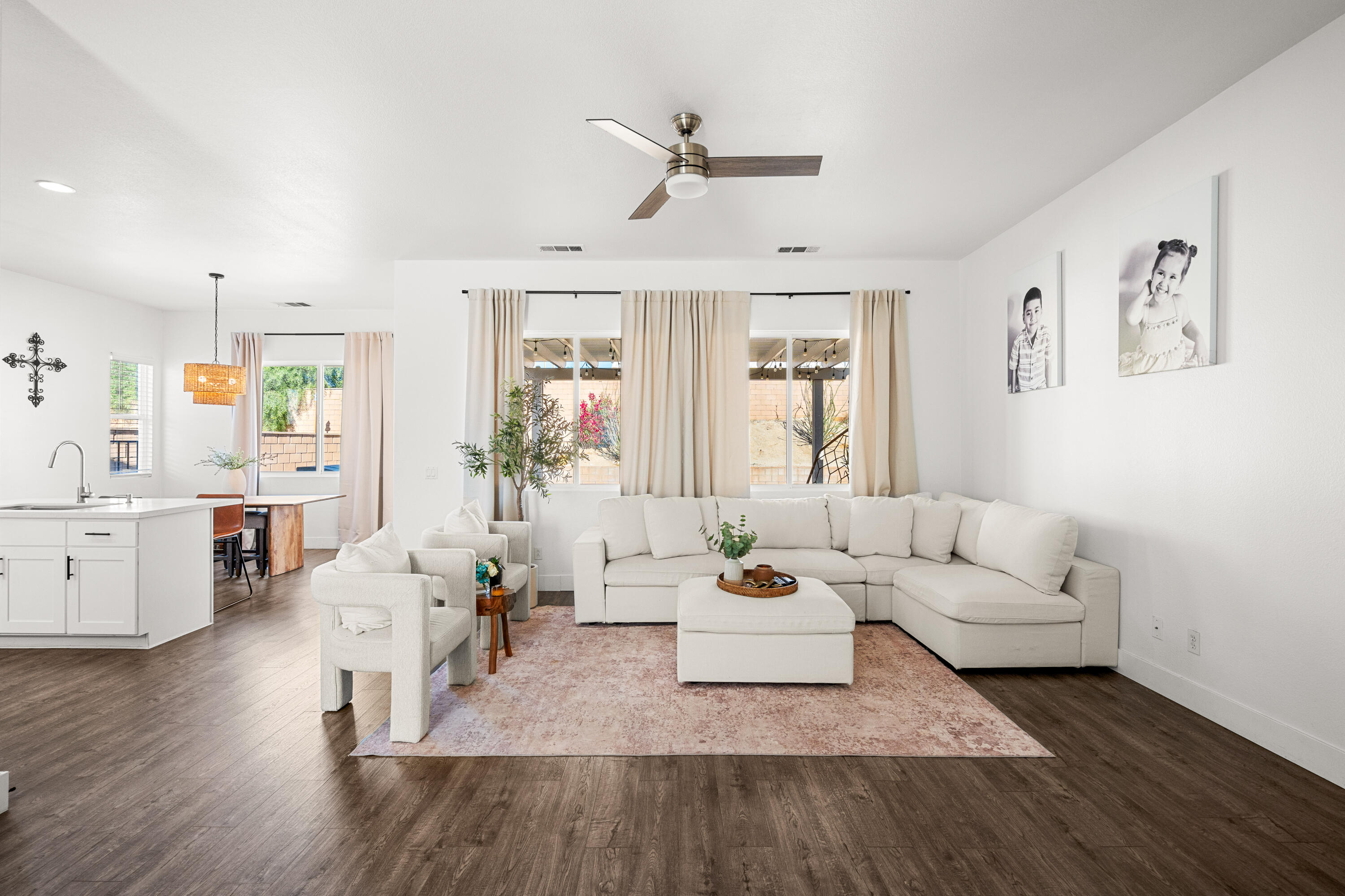 a living room with furniture or window and a wooden floor