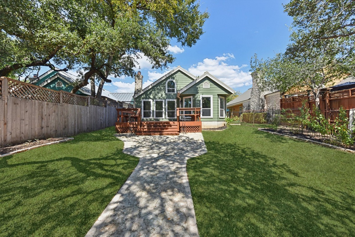 Welcome to this beautiful home with this wonderful backyard!  Digitally enhanced to show green grass.