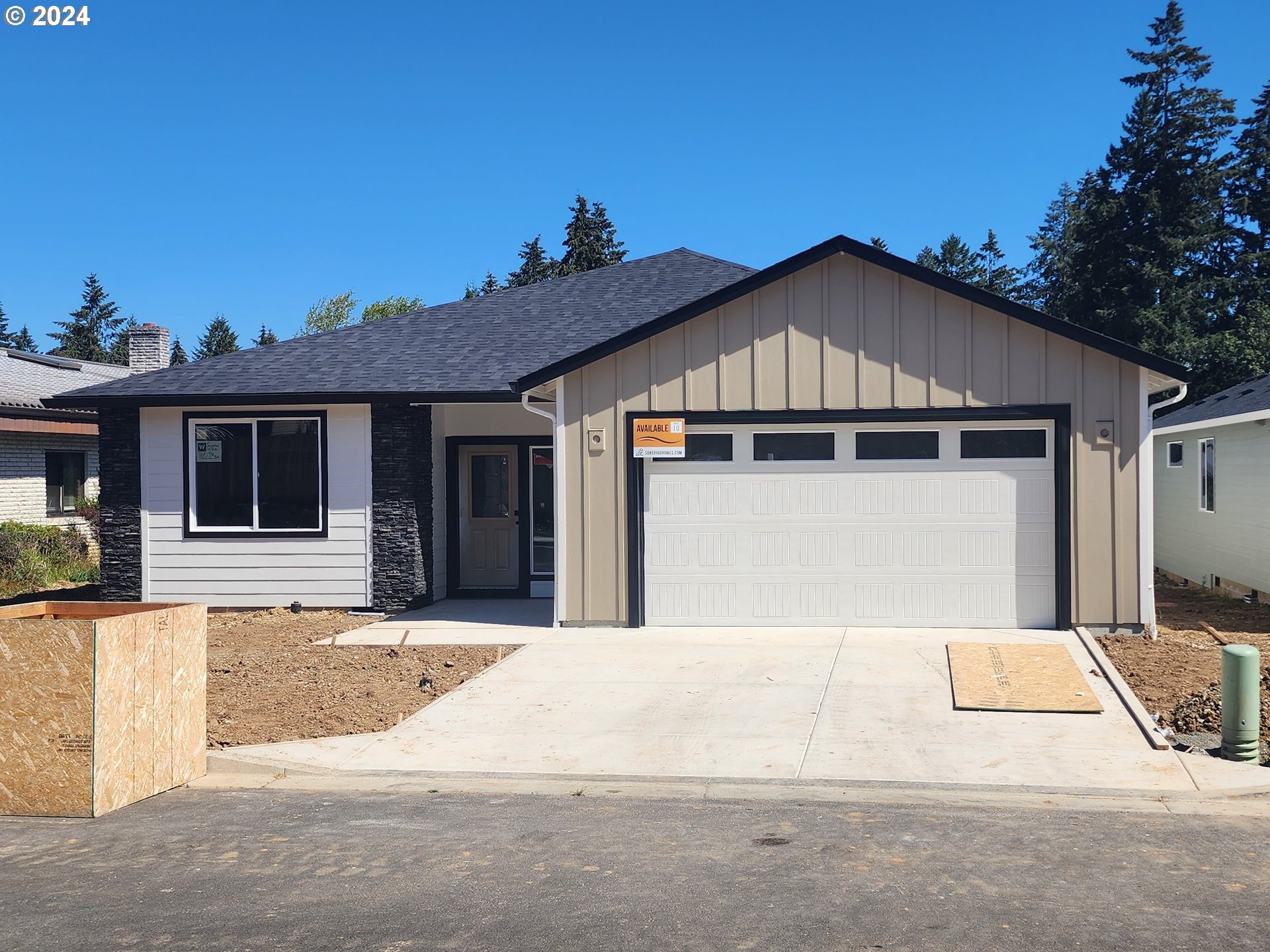 a front view of a house with a outdoor space