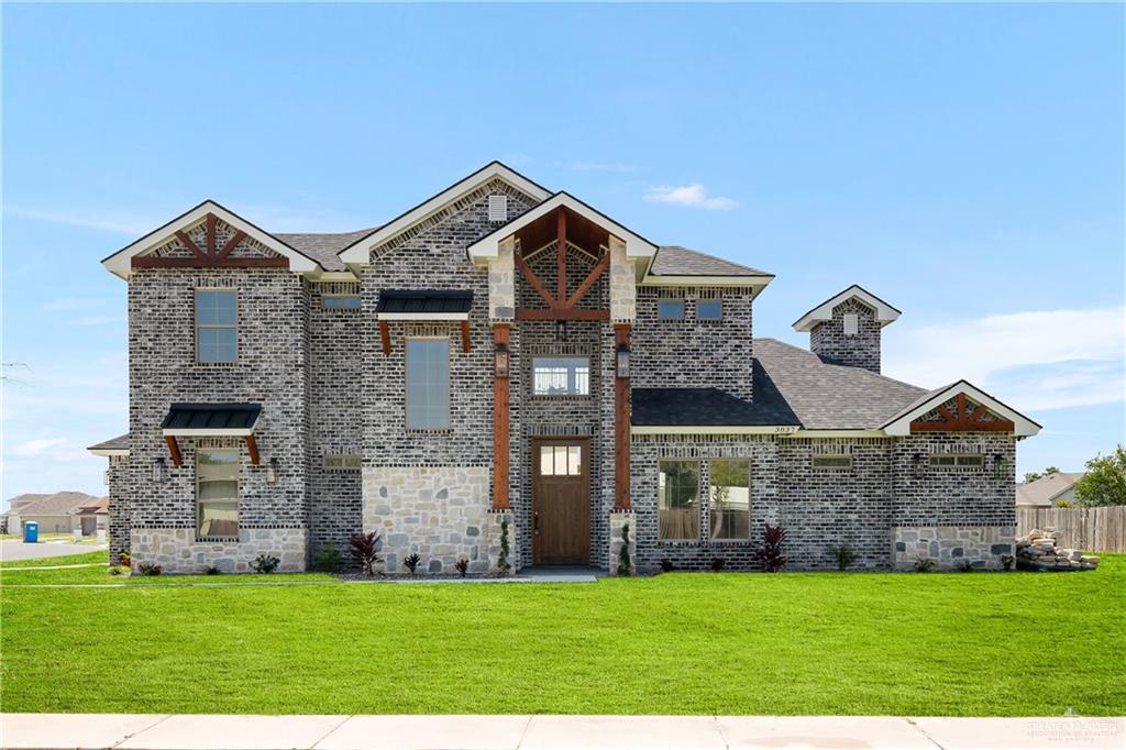 View of front of home with a front lawn