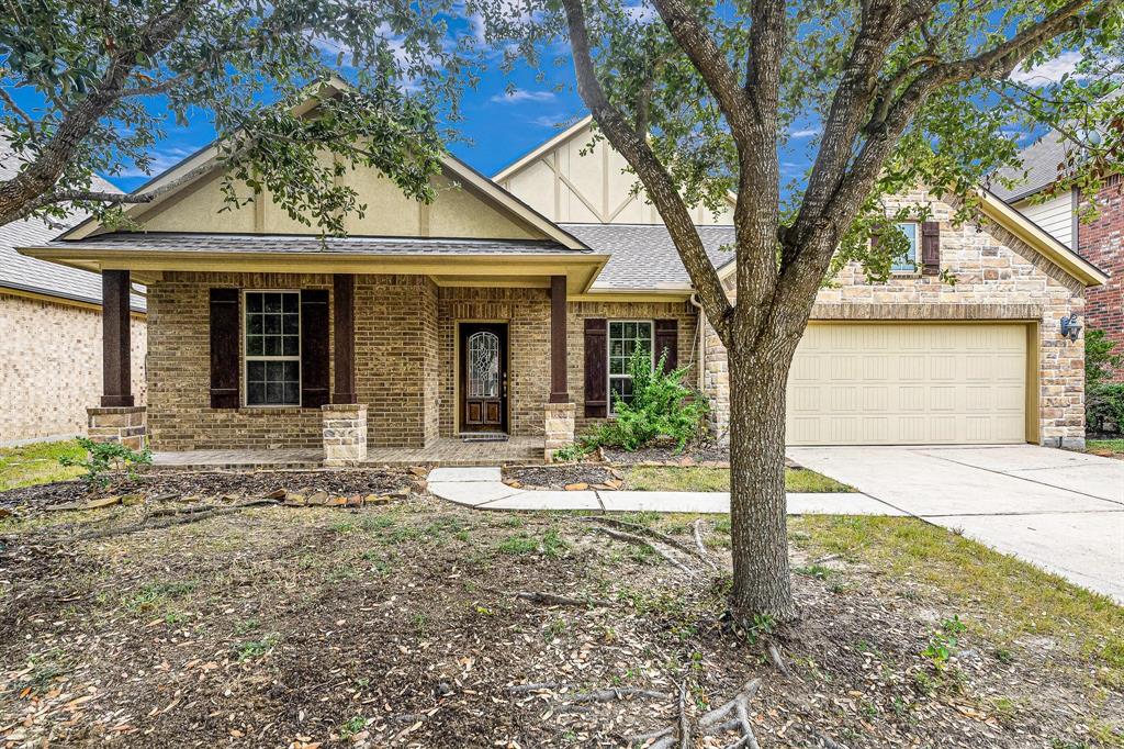 Welcome to your new home at 25209 Quiet Ledge. Beautiful brick and stone elevation creates wonderful curb appeal.