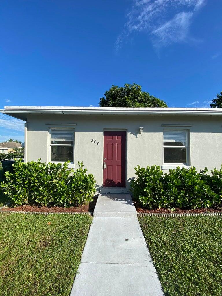 front view of house with a yard