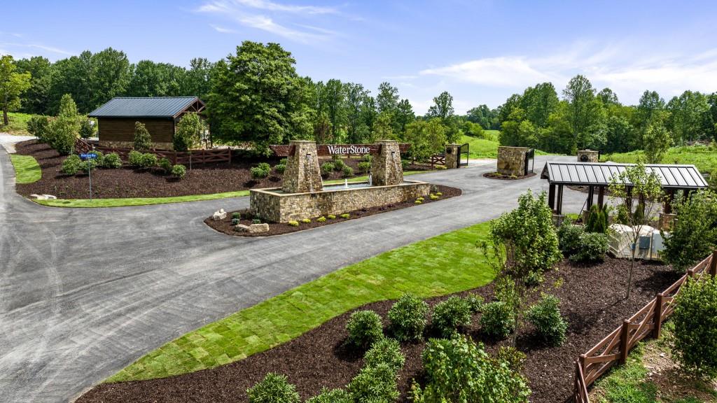 a view of a park with plants and trees