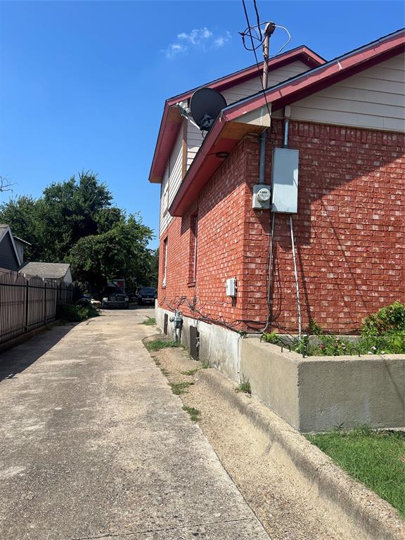 a view of a street with a house