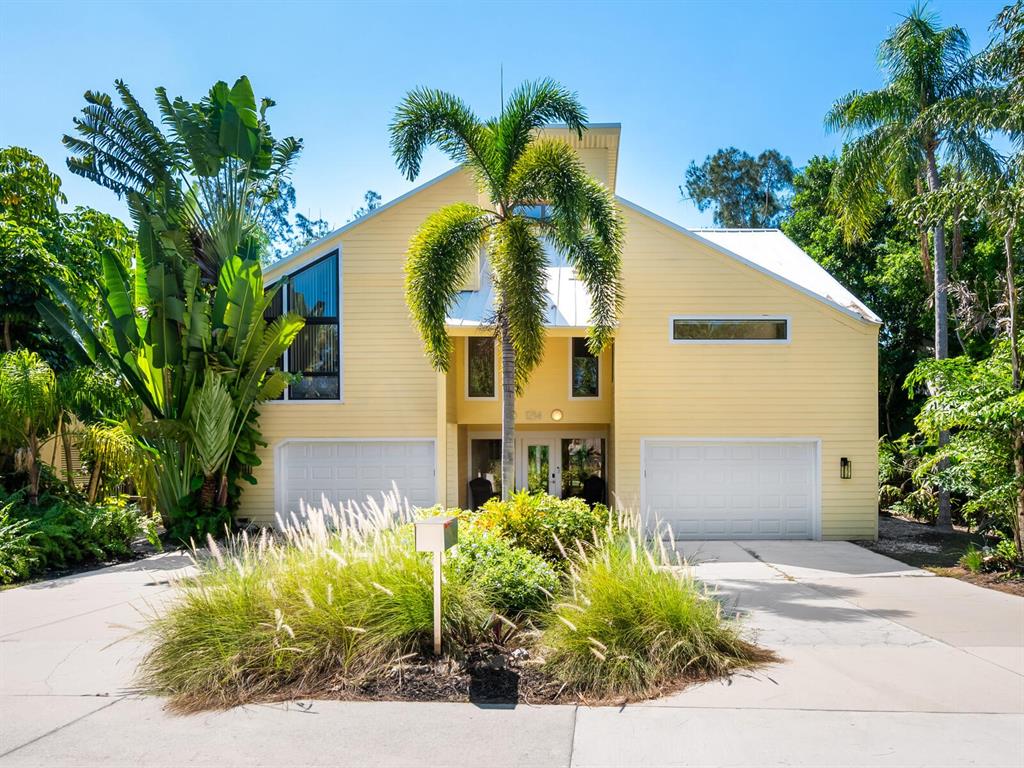 a front view of a house having yard