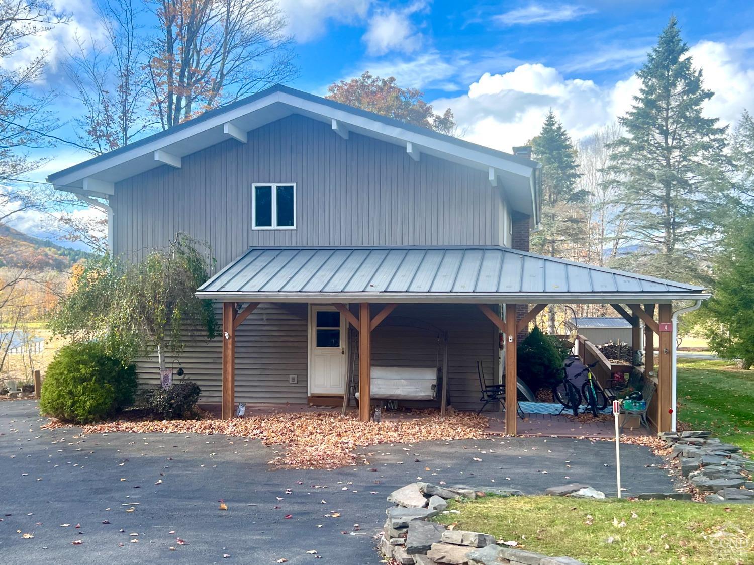 a view of a house with a patio