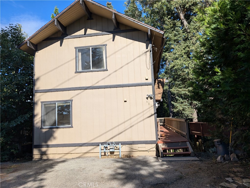 a house with trees in front of it