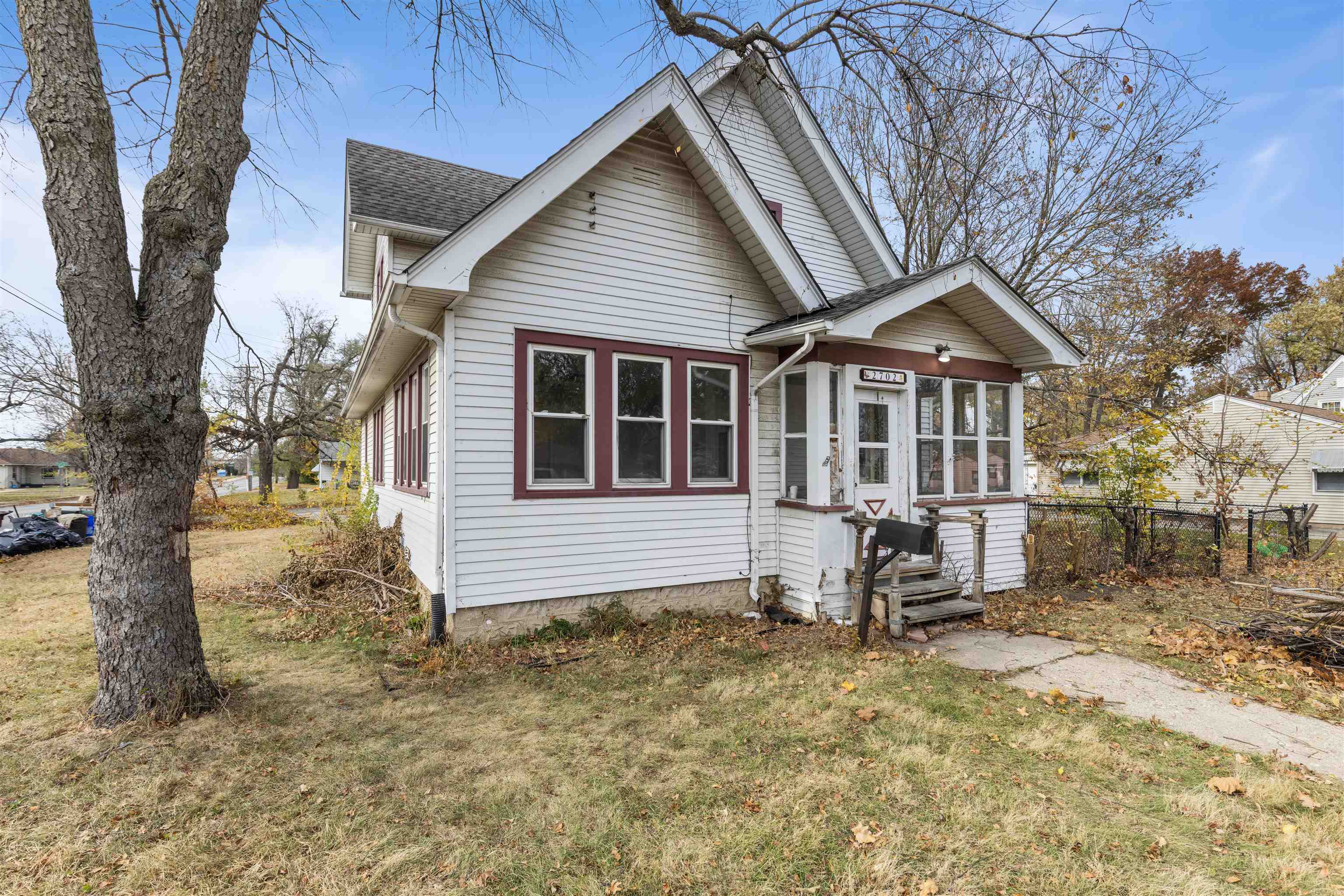 a house with trees in front of it