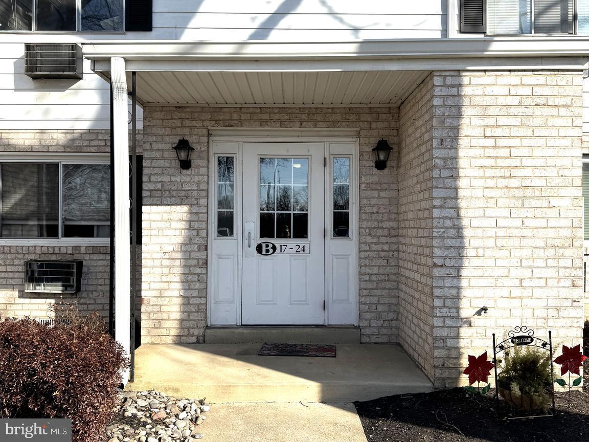 a front view of a house with a garage