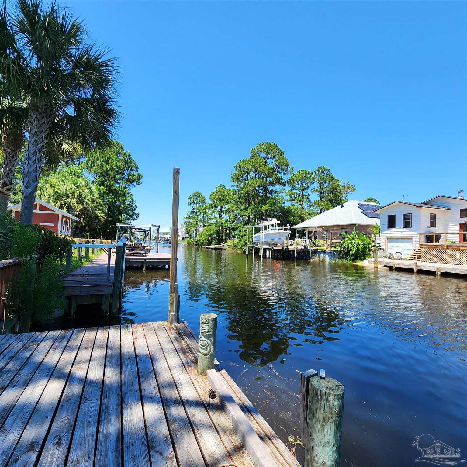 a view of a lake with deck