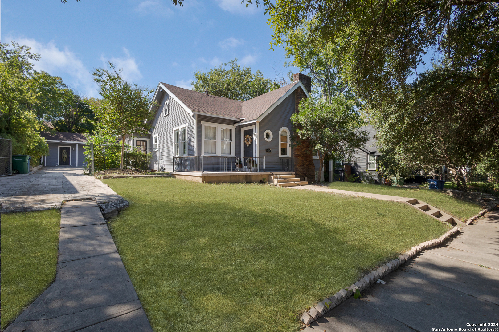 a front view of house with yard