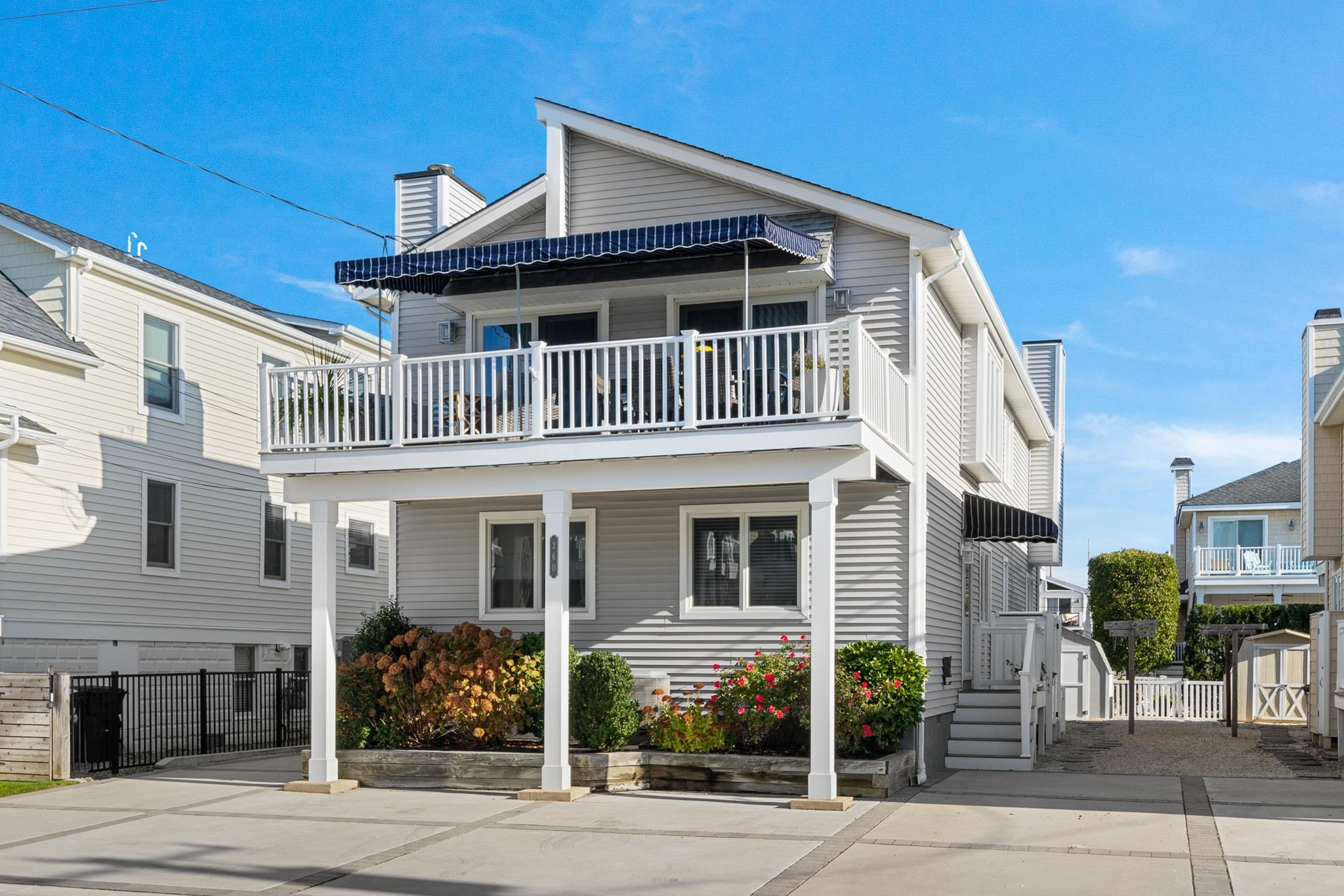 a front view of a house with a porch