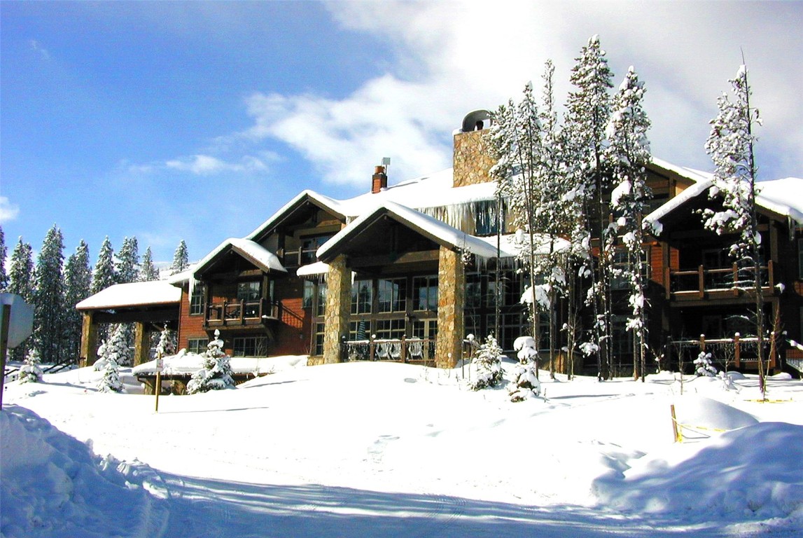 a view of a house with snow on the ground