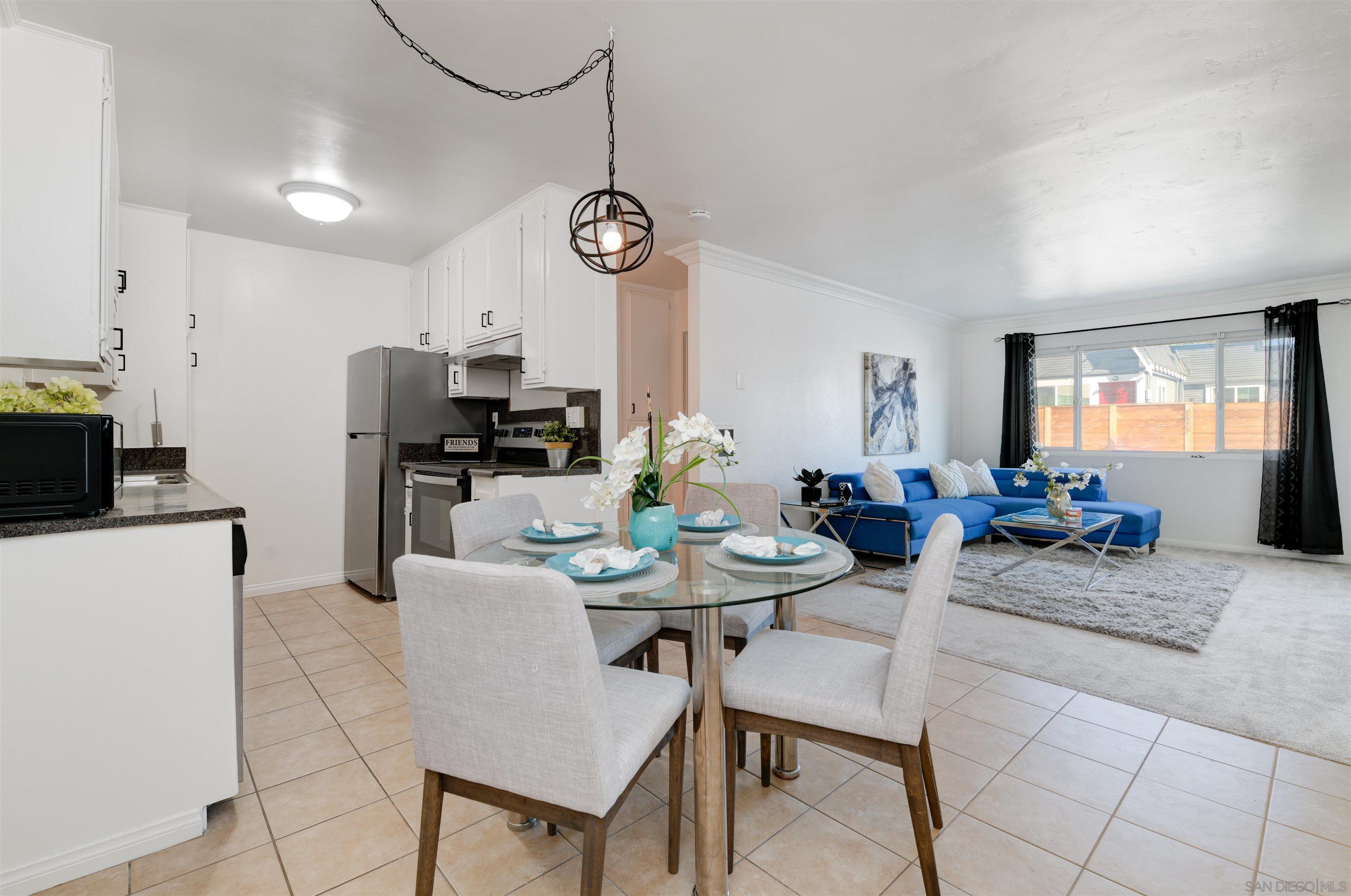 a view of a dining room with furniture