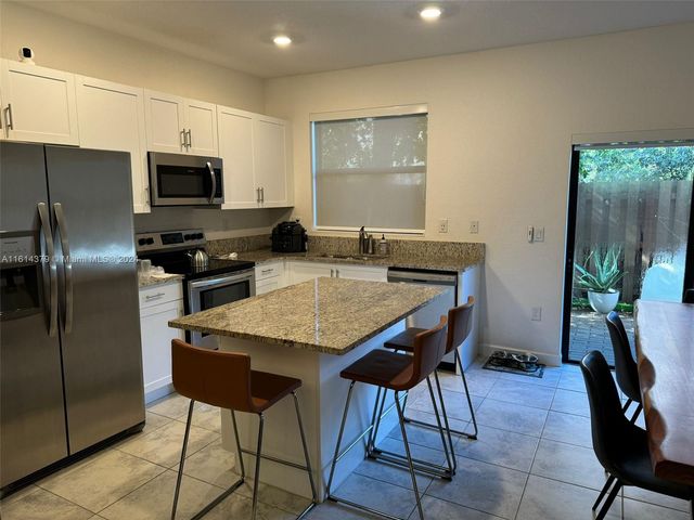 $530,000 | 328 Northeast 208th Terrace, Unit 328 | Ives Estates