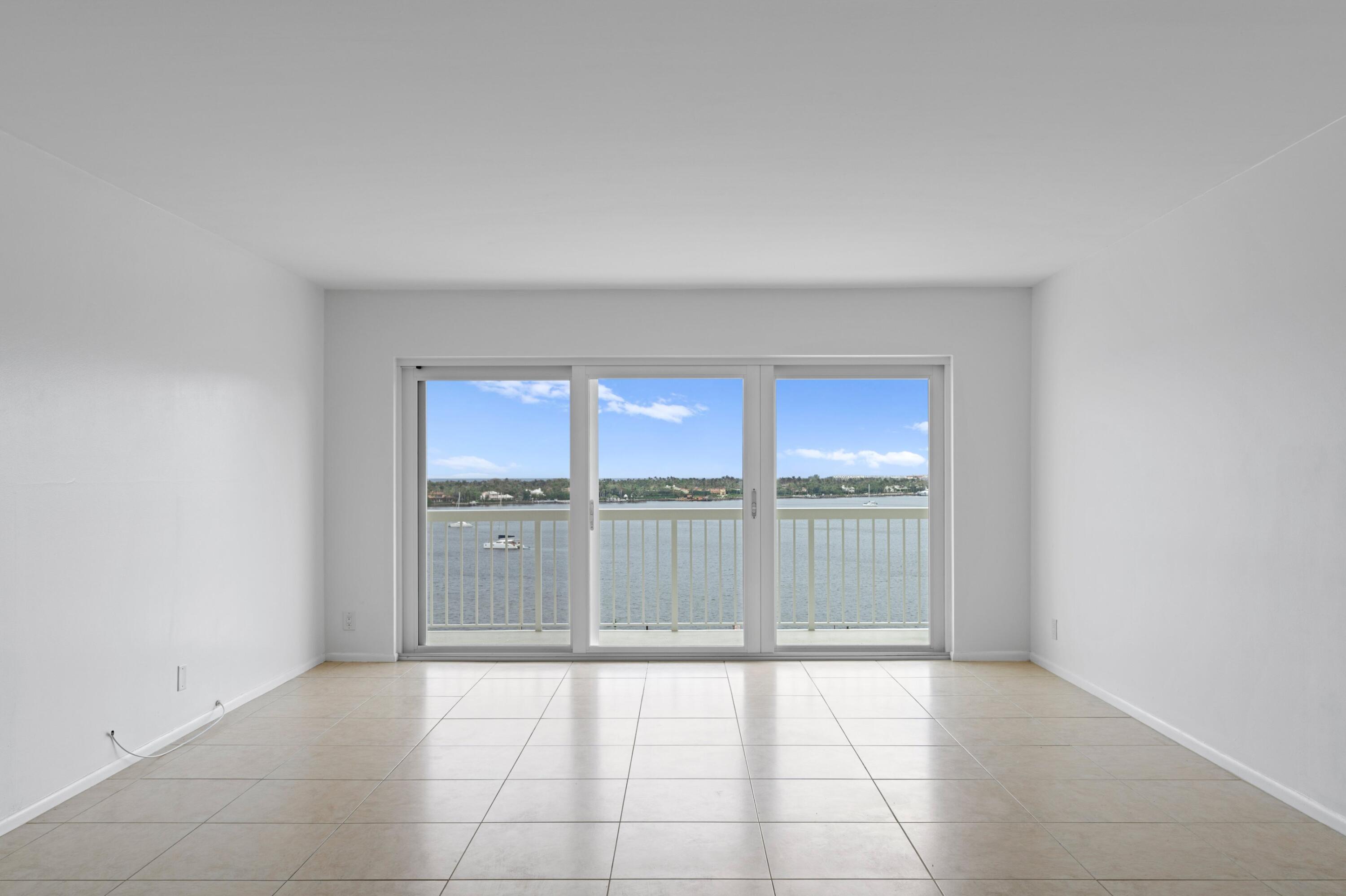 a view of an empty room and window