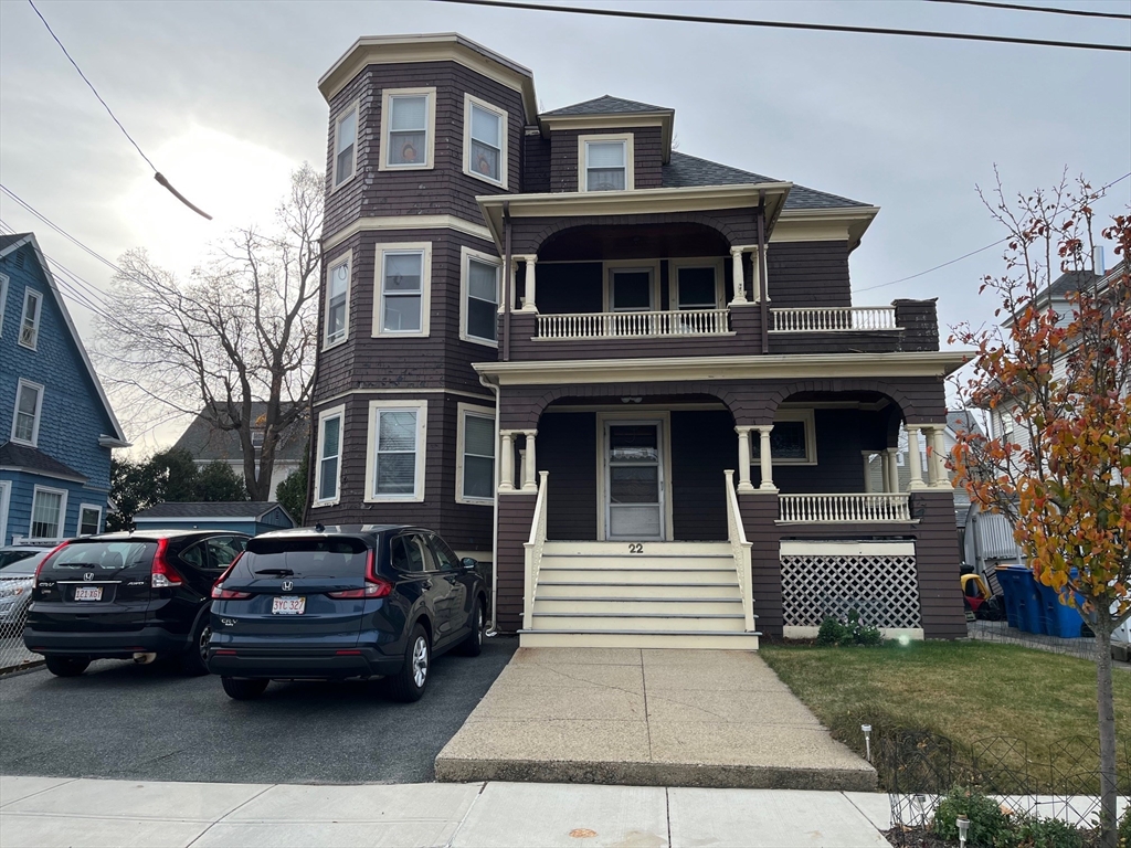 a car parked in front of a house