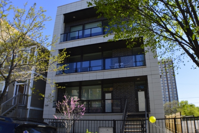 a view of a house with a balcony