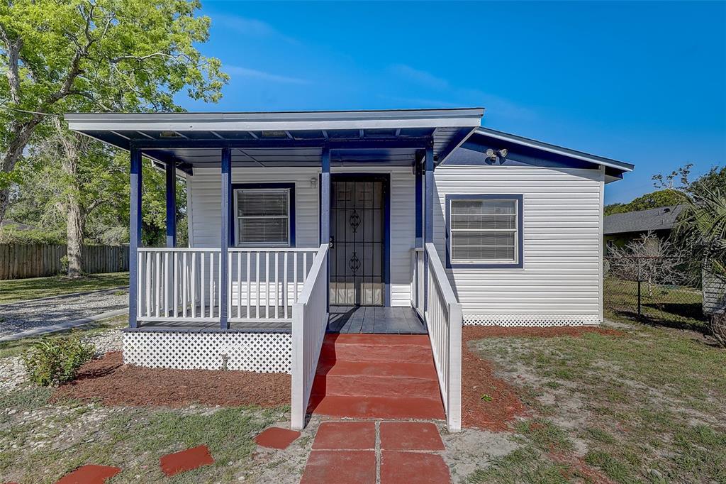 a front view of a house with a porch