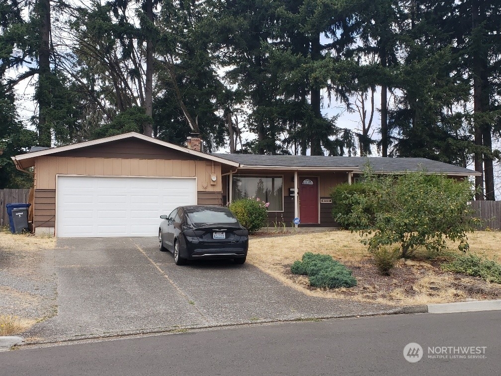 front view of house with a yard